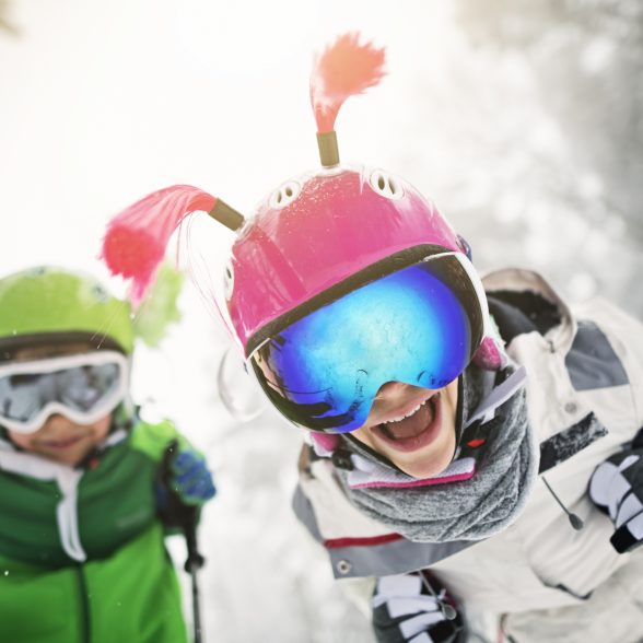 Kids skiing on a beautiful winter day